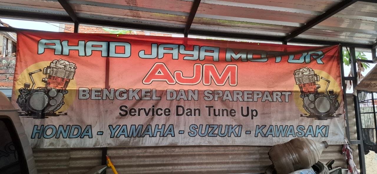 Papan nama Ahad Jaya Motor AJM